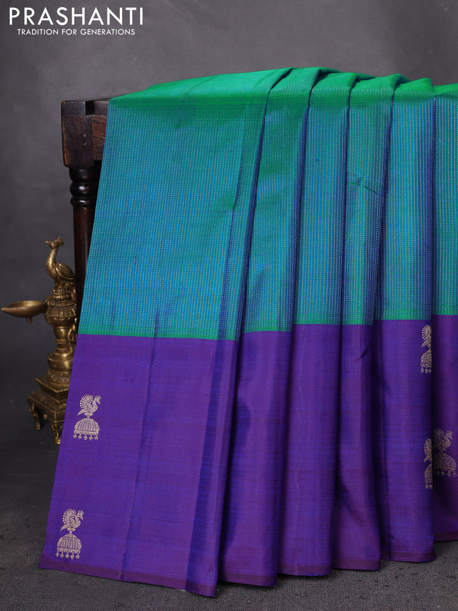 Pure kanchipuram silk saree teal blue and blue with allover zari weaves and zari woven butta border