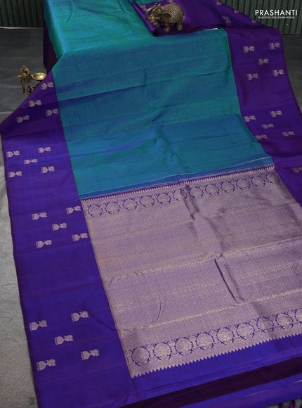 Pure kanchipuram silk saree teal blue and blue with allover zari weaves and zari woven butta border