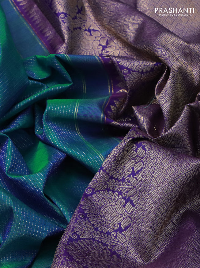 Pure kanchipuram silk saree teal blue and blue with allover zari weaves and zari woven butta border