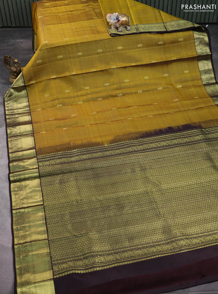 Pure kanchipuram silk saree mehendi green and deep coffee brown with allover small zari checked pattern and zari woven border