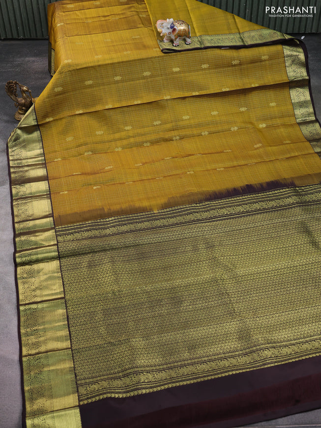 Pure kanchipuram silk saree mehendi green and deep coffee brown with allover small zari checked pattern and zari woven border