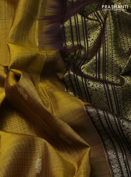 Pure kanchipuram silk saree mehendi green and deep coffee brown with allover small zari checked pattern and zari woven border