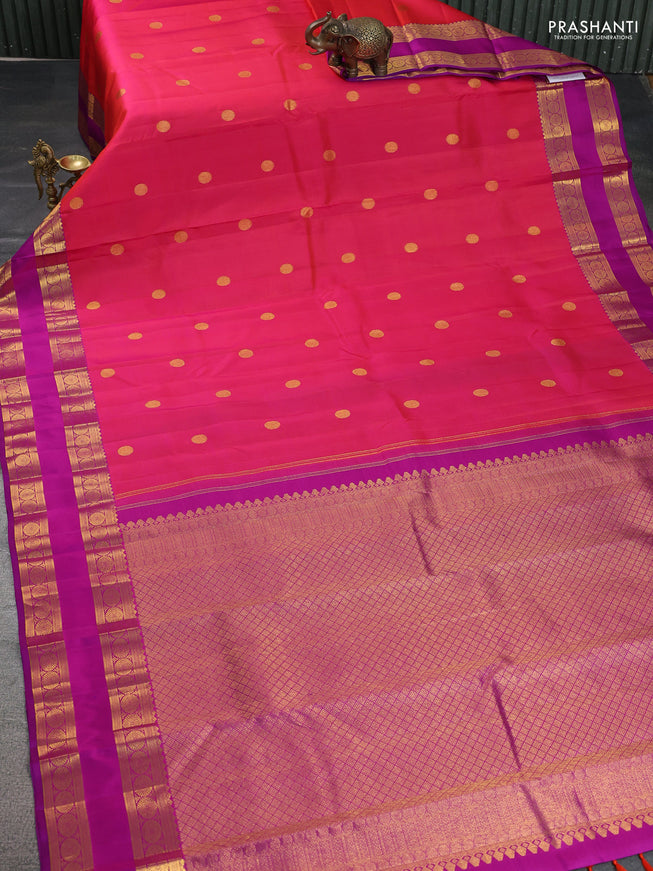 Pure kanchipuram silk saree dual shade of pinkish orange and purple with zari woven buttas and rettapet zari woven border
