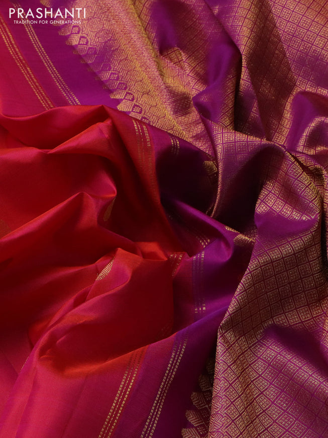 Pure kanchipuram silk saree dual shade of pinkish orange and purple with zari woven buttas and rettapet zari woven border