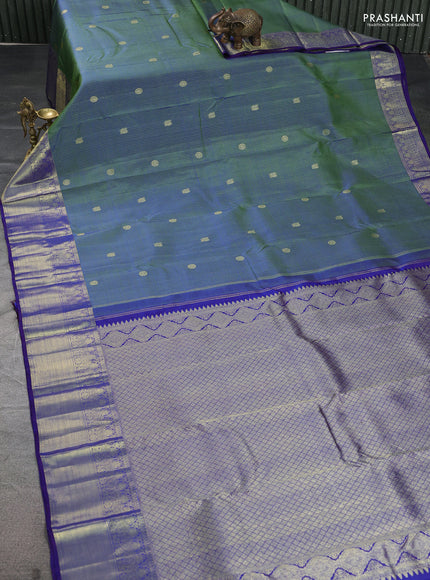Pure kanchipuram silk saree dual shade of green and blue with allover zari weaves & buttas and zari woven border