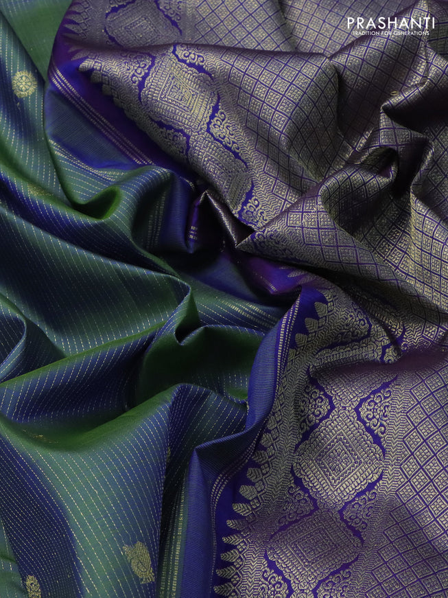 Pure kanchipuram silk saree dual shade of green and blue with allover zari weaves & buttas and zari woven border