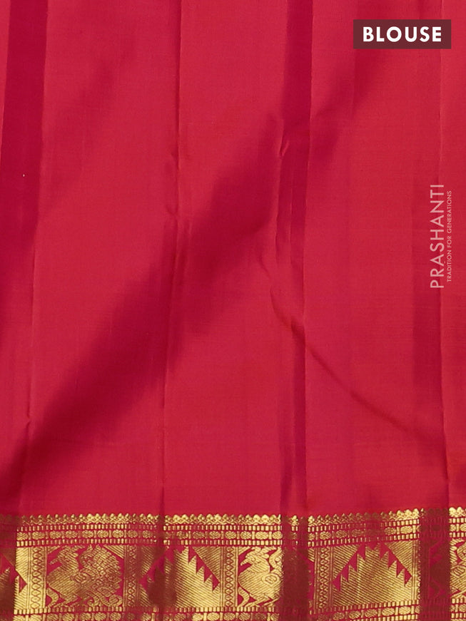 Pure kanchipuram silk saree dual shade of pinkish orange with zari woven buttas and zari woven border