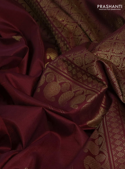 Pure kanchipuram silk saree maroon with zari woven buttas and long zari woven border