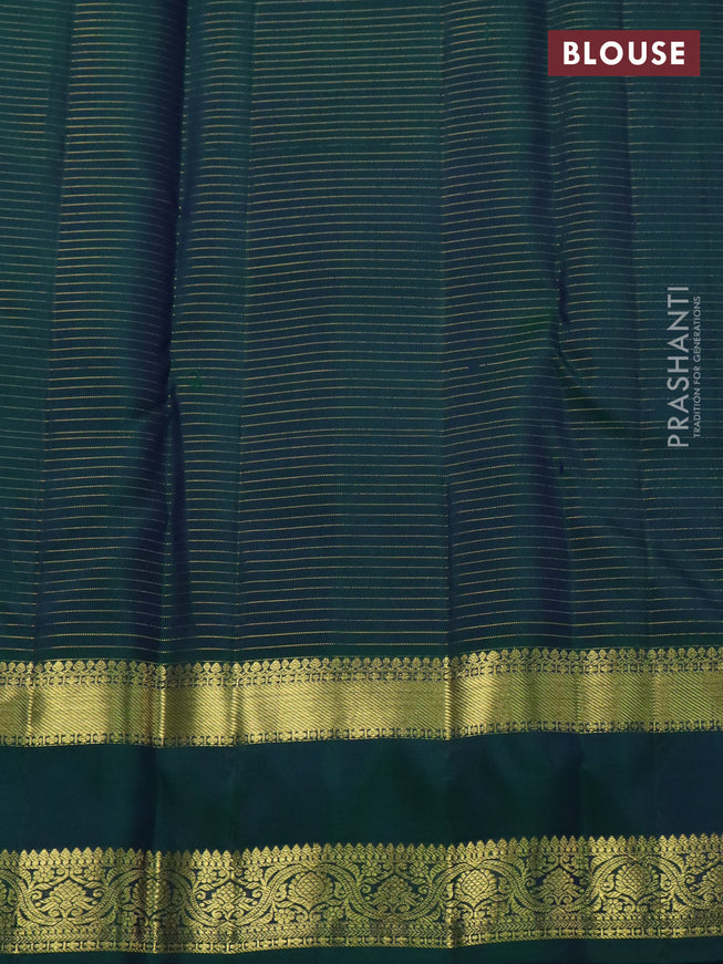 Pure kanchipuram silk saree purple and dual shade of green with allover zari checked pattern and rettapet zari woven border