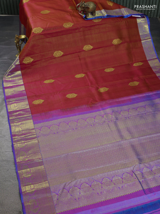 Pure kanchipuram silk saree dual shade of pinkish orange and dual shade of blue with allover zari woven stripes pattern & buttas and zari woven border