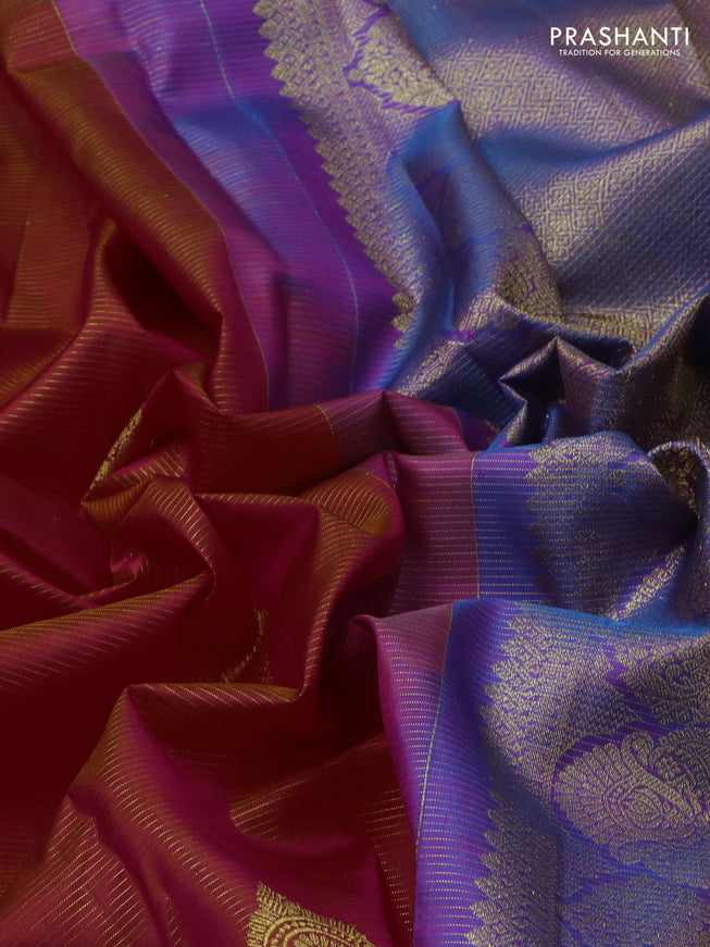 Pure kanchipuram silk saree dual shade of pinkish orange and dual shade of blue with allover zari woven stripes pattern & buttas and zari woven border