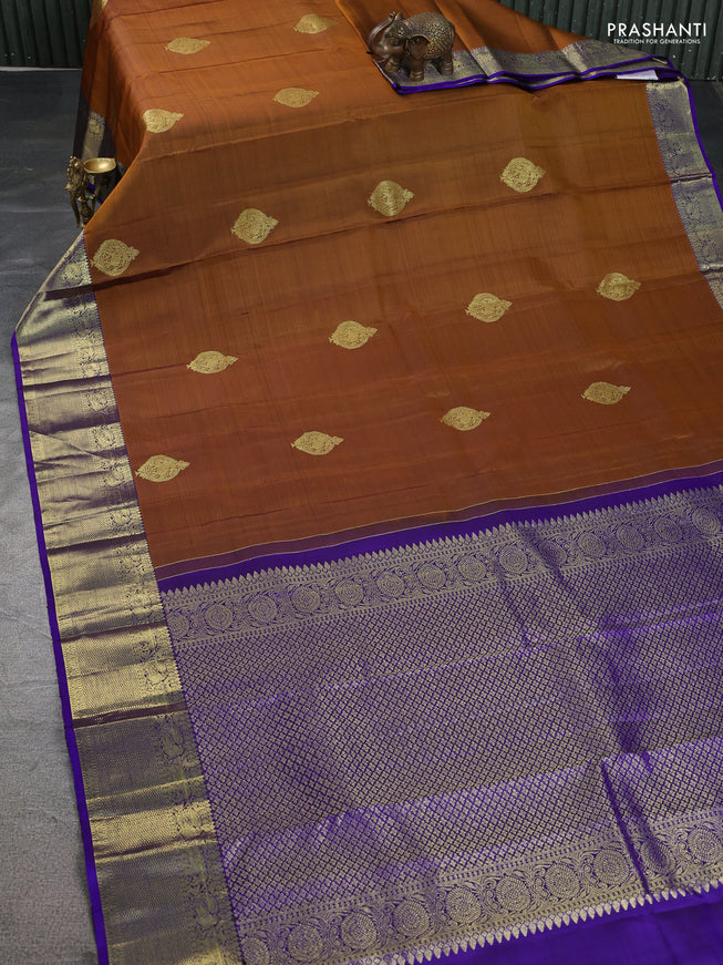 Pure kanchipuram silk saree dark mustard and blue with zari woven buttas and zari woven border