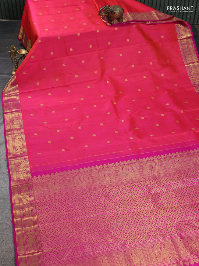 Pure kanchipuram silk saree dual shade of pinkish orange and pink with zari woven buttas and zari woven border