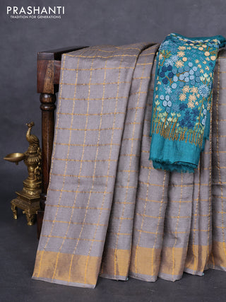 Pure tussar silk saree grey and teal green with allover zari checked pattern and zari woven border