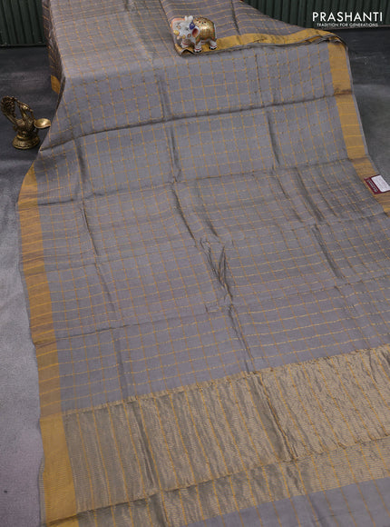 Pure tussar silk saree grey and teal green with allover zari checked pattern and zari woven border