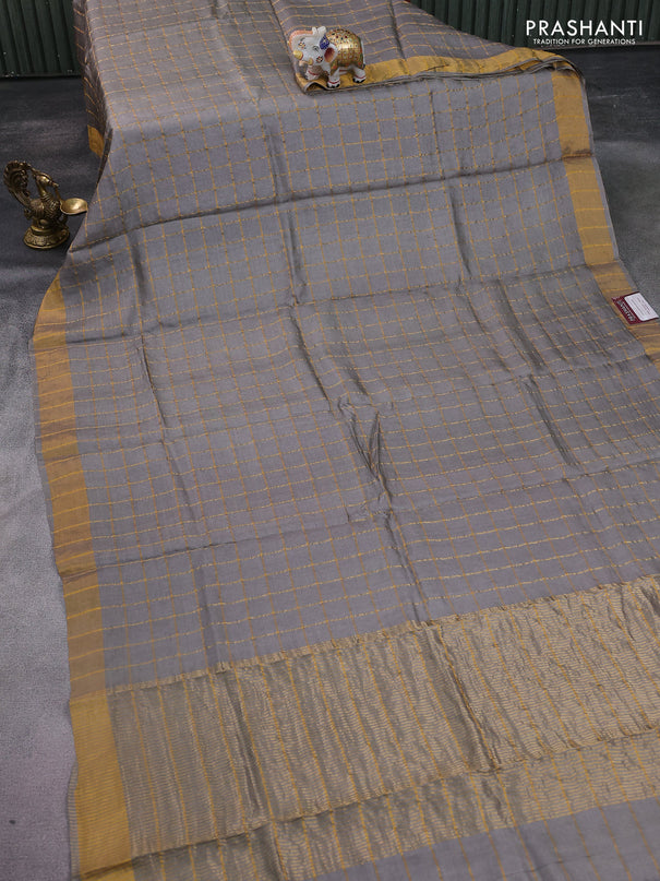 Pure tussar silk saree grey and teal green with allover zari checked pattern and zari woven border