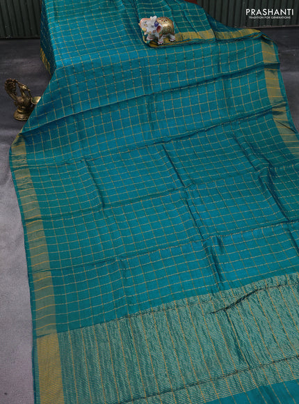 Pure tussar silk saree cs blue and chikku shade with allover zari checked pattern and zari woven border