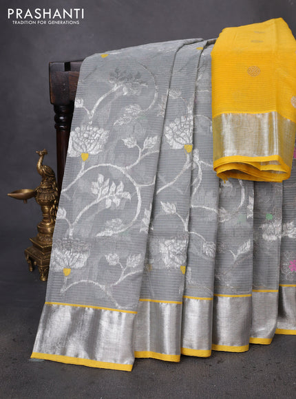 Pure zari kota silk saree pastel grey and yellow with allover silver zari woven floral weaves and silver zari woven border