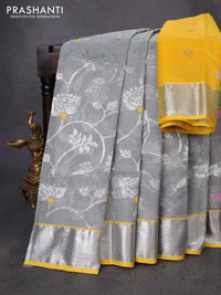 Pure zari kota silk saree pastel grey and yellow with allover silver zari woven floral weaves and silver zari woven border