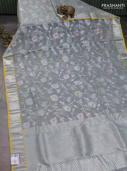 Pure zari kota silk saree pastel grey and yellow with allover silver zari woven floral weaves and silver zari woven border
