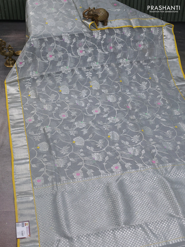 Pure zari kota silk saree pastel grey and yellow with allover silver zari woven floral weaves and silver zari woven border