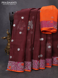 Pure zari kota silk saree brown and orange with silver zari woven buttas and floral design silver zari woven border