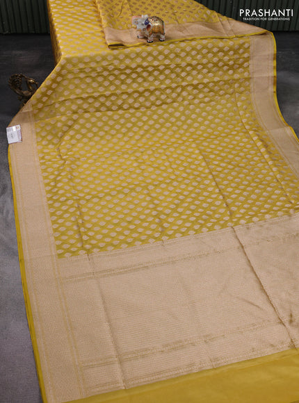 Banarasi tissue silk saree lime yellow with allover zari woven buttas and zari woven border