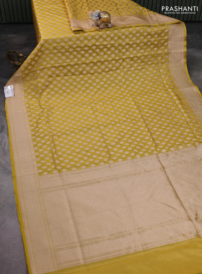 Banarasi tissue silk saree lime yellow with allover zari woven buttas and zari woven border