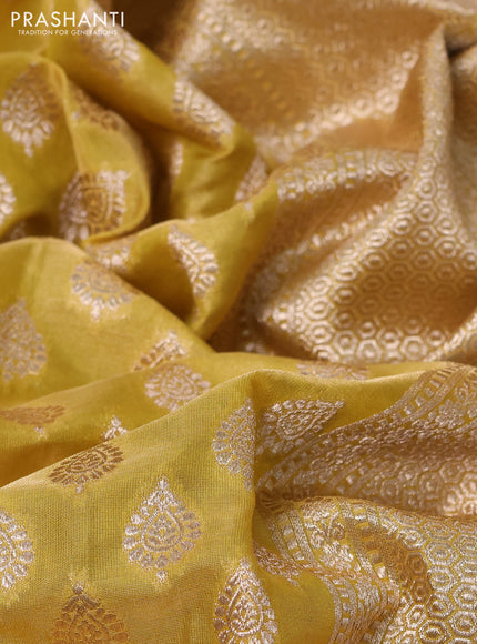 Banarasi tissue silk saree lime yellow with allover zari woven buttas and zari woven border