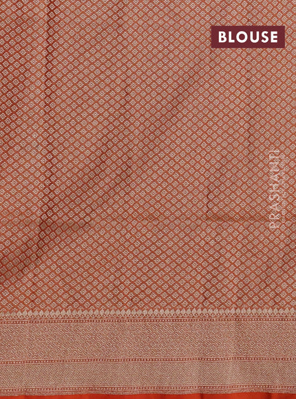 Banarasi tissue silk saree rustic orange with allover zari woven brocade weaves and zari woven border