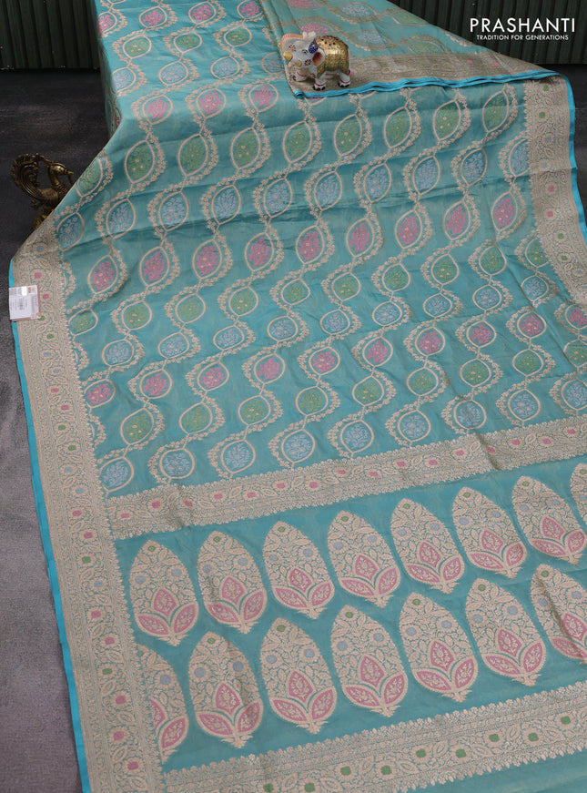Banarasi tissue silk saree teal blue with allover zari woven brocade weaves and zari woven border