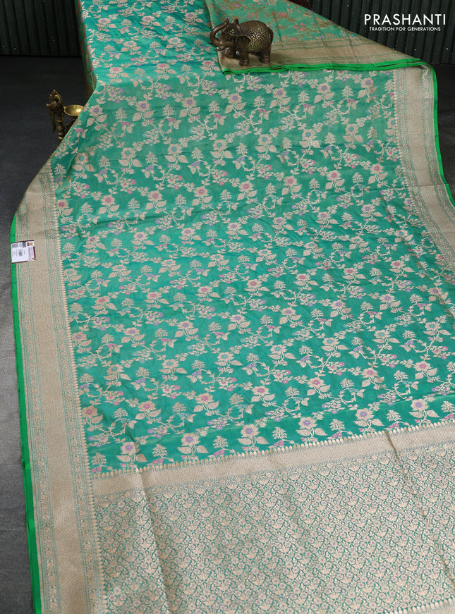 Banarasi tissue silk saree teal green with allover zari woven brocade weaves and zari woven border