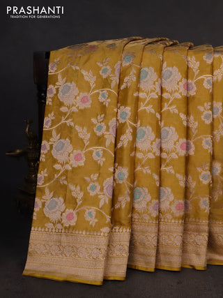 Banarasi tissue silk saree mustard yellow with allover floral zari woven brocade weaves and zari woven border