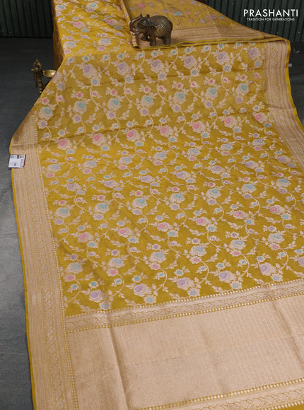Banarasi tissue silk saree mustard yellow with allover floral zari woven brocade weaves and zari woven border