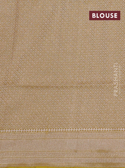 Banarasi tissue silk saree mustard yellow with allover floral zari woven brocade weaves and zari woven border