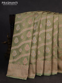 Banarasi tissue silk saree pista green with allover zari woven brocade weaves and zari woven border