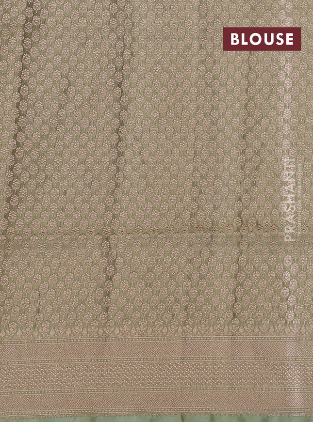 Banarasi tissue silk saree pista green with allover zari woven brocade weaves and zari woven border