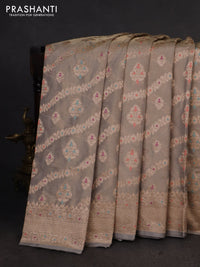 Banarasi tissue silk saree pastel grey with allover zari woven brocade weaves and zari woven border