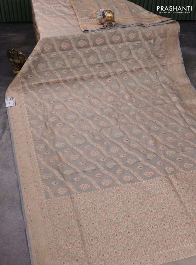 Banarasi tissue silk saree pastel grey with allover zari woven brocade weaves and zari woven border