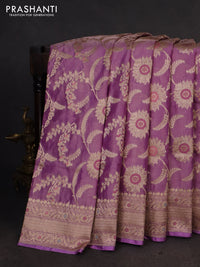 Banarasi tissue silk saree lavender with allover floral zari woven brocade weaves and zari woven border