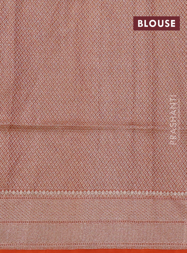 Banarasi tissue silk saree orange with allover floral zari woven brocade weaves and zari woven border
