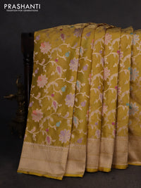 Banarasi tissue silk saree lime yellow with allover floral zari woven brocade weaves and zari woven border