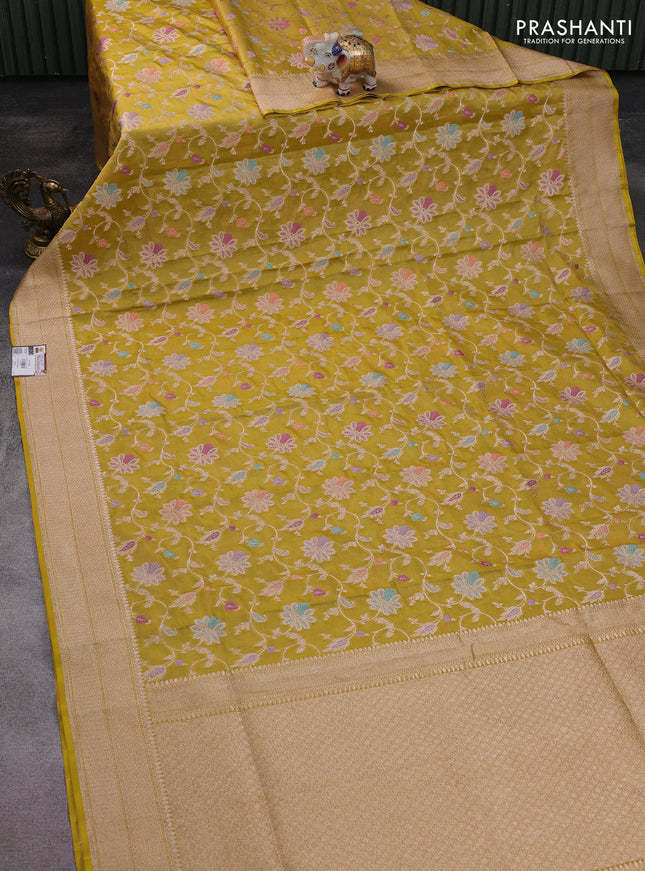 Banarasi tissue silk saree lime yellow with allover floral zari woven brocade weaves and zari woven border