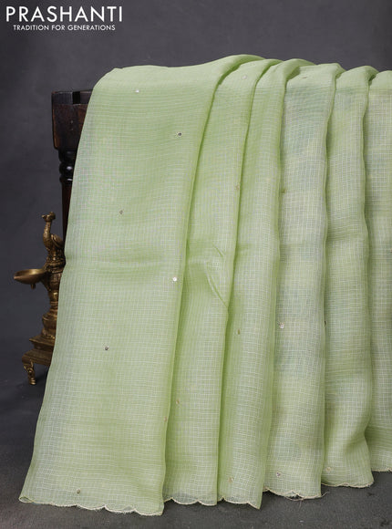 Pure silk kota saree pista green with sequin buttas and scallop design border Kalamkari prints pita work blouse