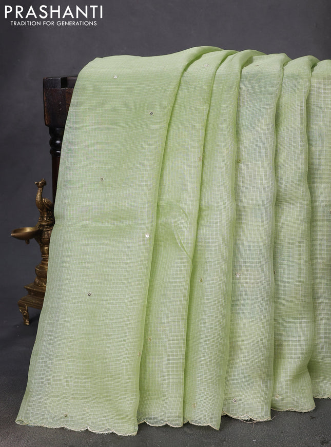 Pure silk kota saree pista green with sequin buttas and scallop design border Kalamkari prints pita work blouse