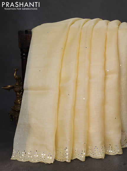 Pure silk kota saree pale yellow with mirror embrodery buttas and mirror embriodery border