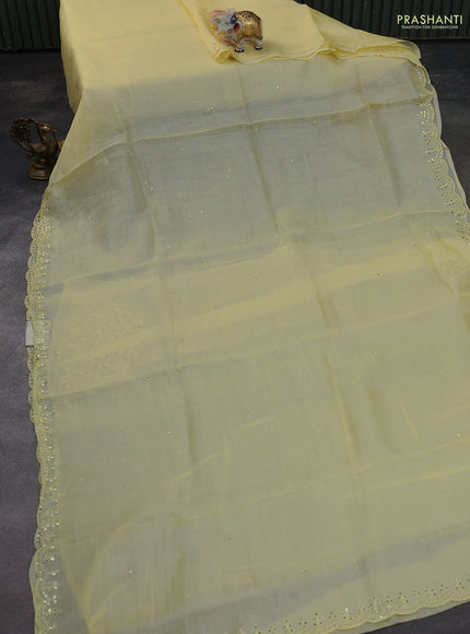 Pure silk kota saree pale yellow with mirror embrodery buttas and mirror embriodery border