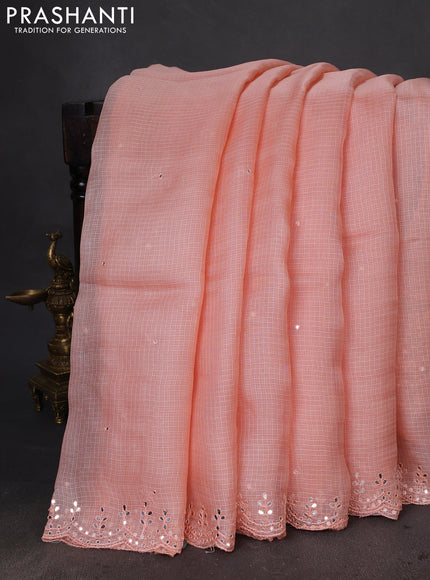 Pure silk kota saree peach shade with mirror embrodery buttas and mirror embriodery border