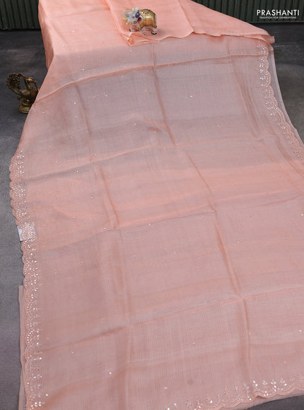 Pure silk kota saree peach shade with mirror embrodery buttas and mirror embriodery border