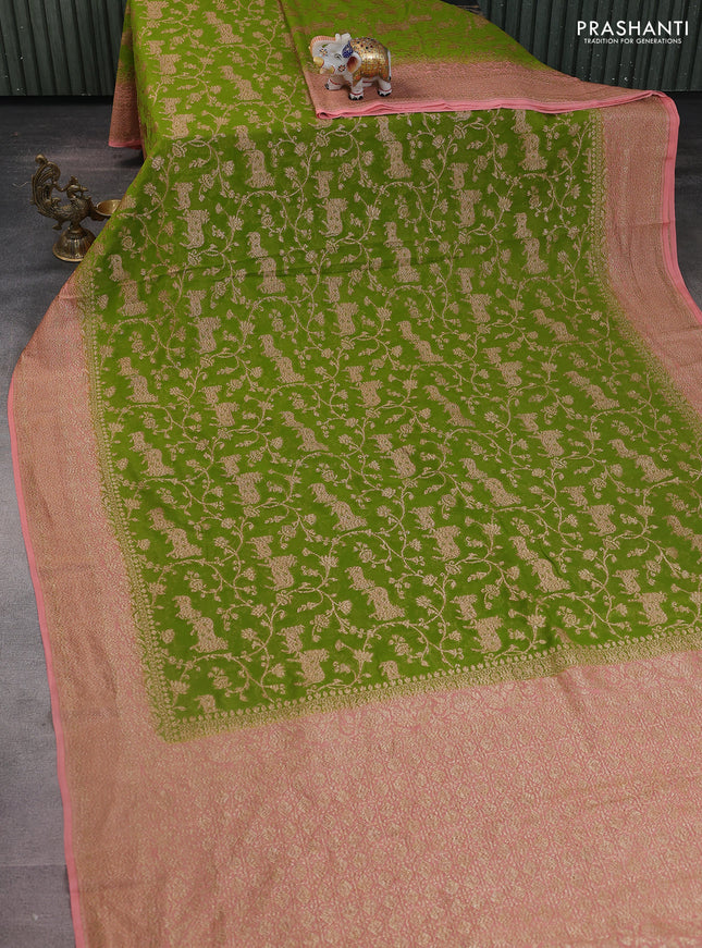 Banarasi georgette saree light green and peach pink with allover thread & zari weaves and woven border